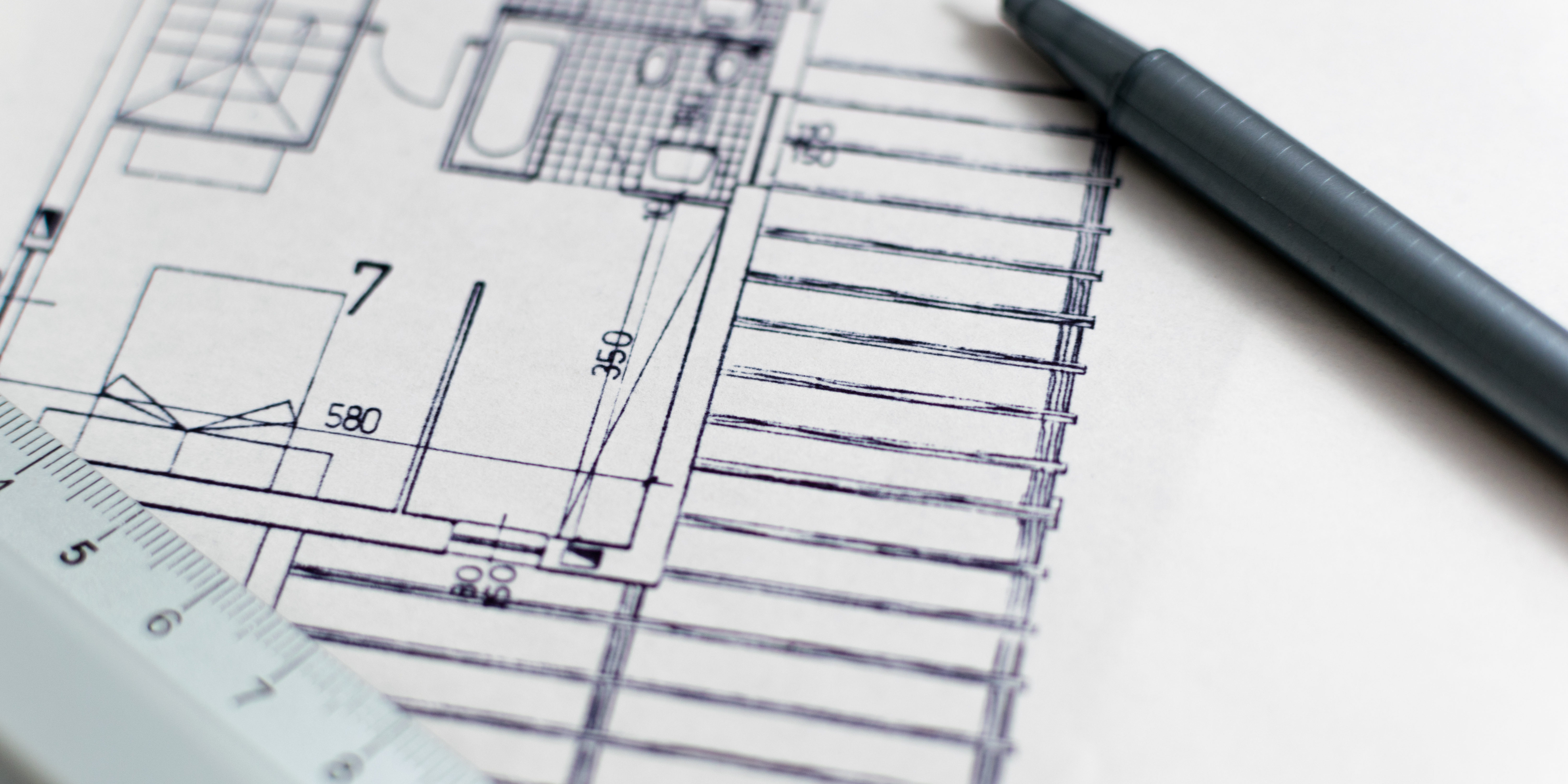 Architecture blueprint with pen and ruler